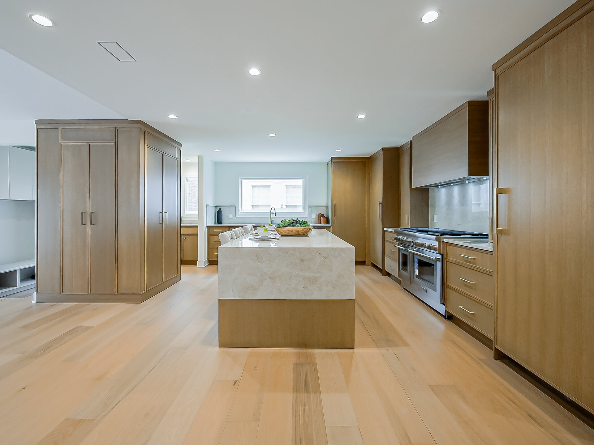 Kitchen wide view with waterfall island
