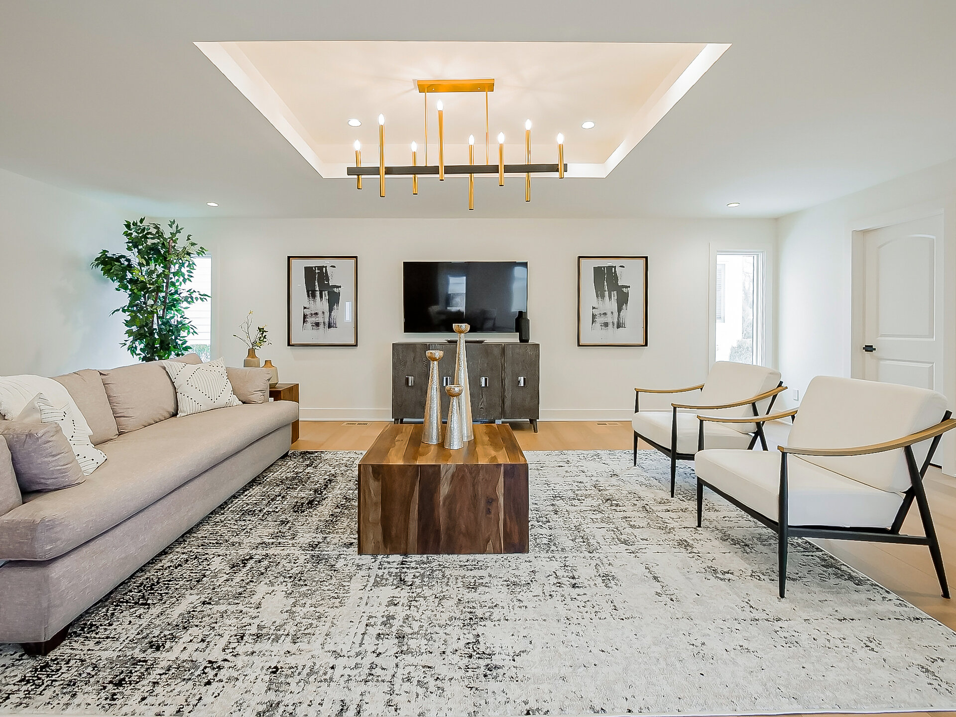 Living room with linear chandelier