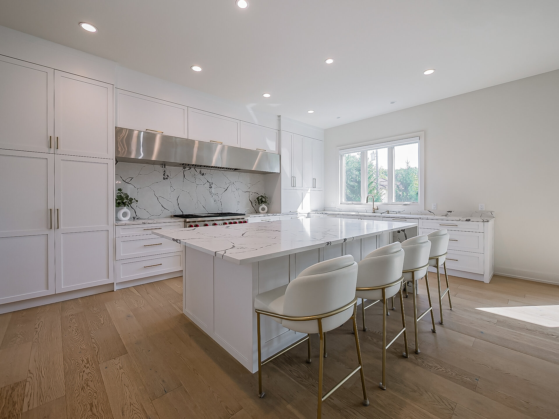 Kitchen with marble waterfall island