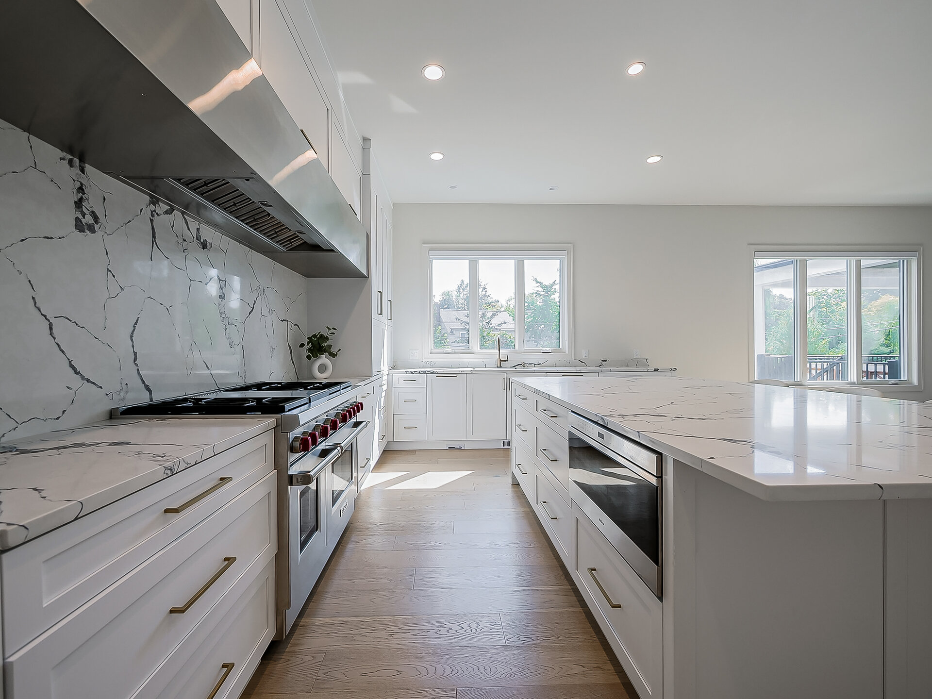 Kitchen long view with marble backsplash